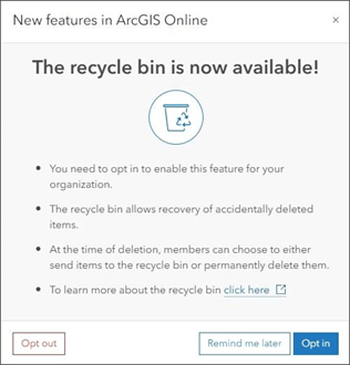 Janela de notificação com o título 'New features in ArcGIS Online' informando que a lixeira está disponível. O texto explica que é necessário optar por habilitar essa função, permitindo a recuperação de itens excluídos acidentalmente. Opções de botões: 'Opt out', 'Remind me later' e 'Opt in'