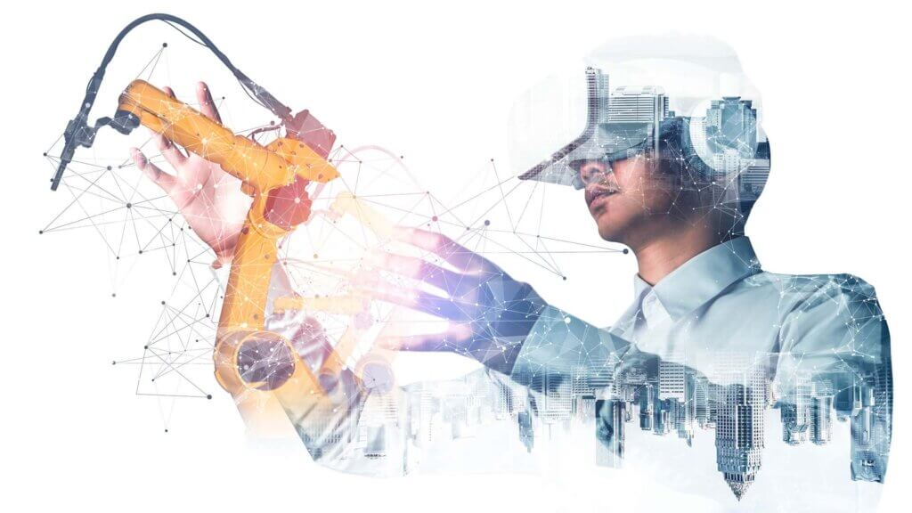 Profissional utilizando óculos de realidade virtual (VR) interagindo com um braço robótico em um ambiente digital integrado. A imagem representa a fusão entre o mundo físico e o digital, simbolizando o uso de tecnologias como gêmeos digitais e inteligência espacial na Indústria 4.0.